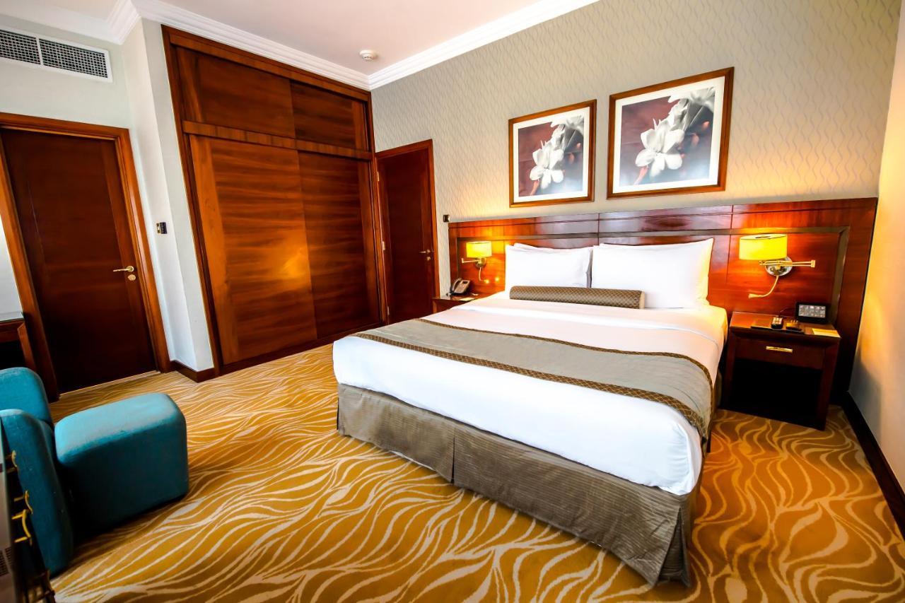 แกรนด์ เมอร์เคียว เรสซิเดนซ์ อาบู ดาบี Aparthotel อาบูดาบี ภายนอก รูปภาพ A bedroom at the hotel