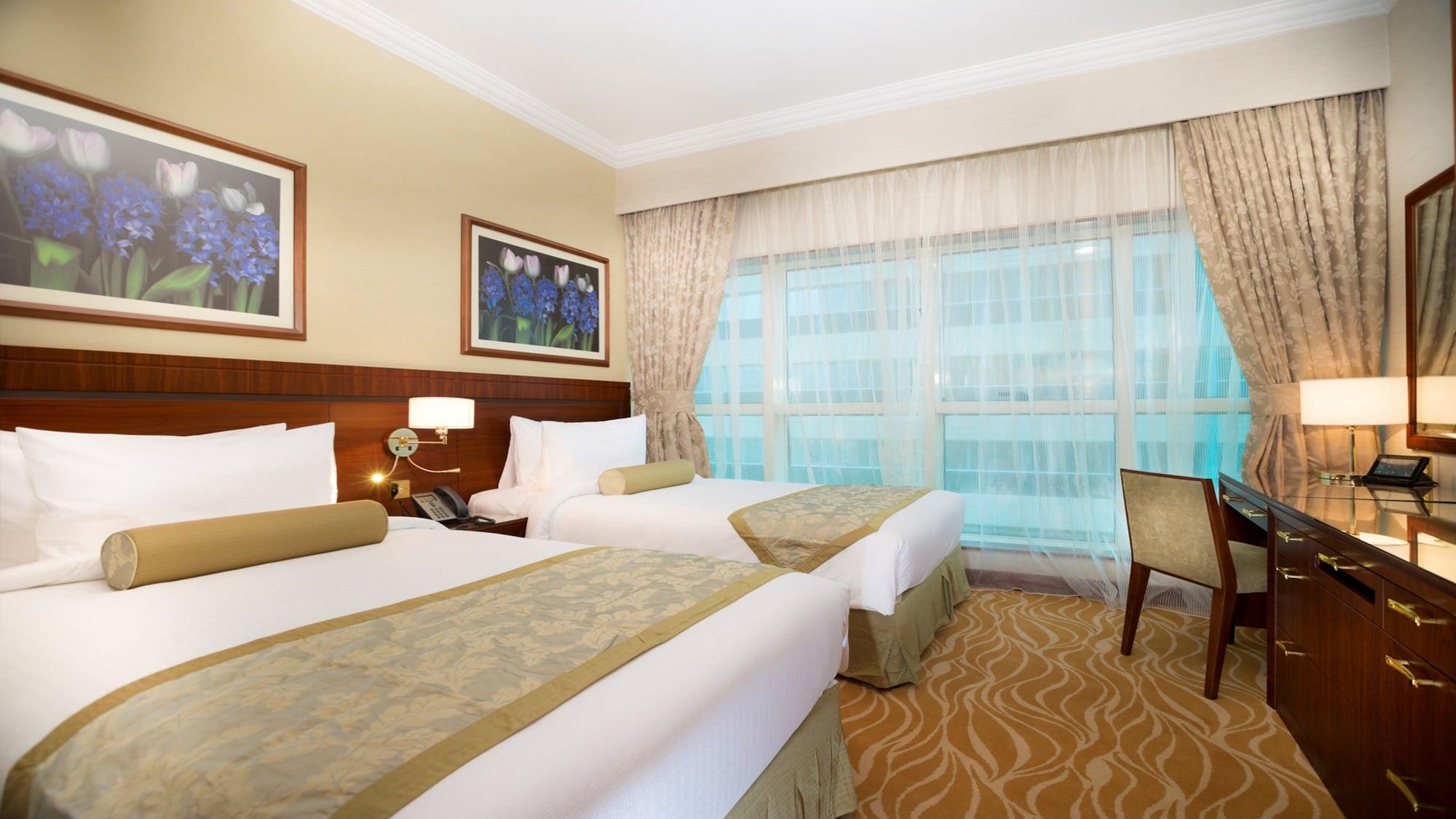 แกรนด์ เมอร์เคียว เรสซิเดนซ์ อาบู ดาบี Aparthotel อาบูดาบี ภายนอก รูปภาพ A room at the hotel