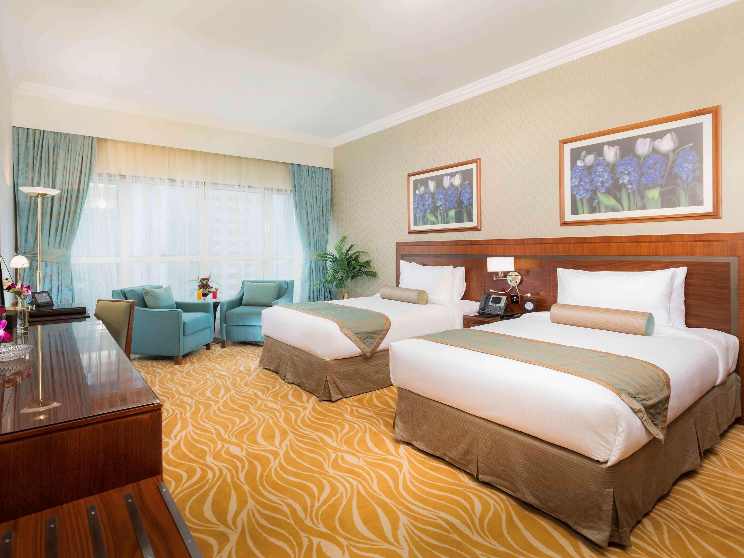 แกรนด์ เมอร์เคียว เรสซิเดนซ์ อาบู ดาบี Aparthotel อาบูดาบี ภายนอก รูปภาพ A room at the hotel