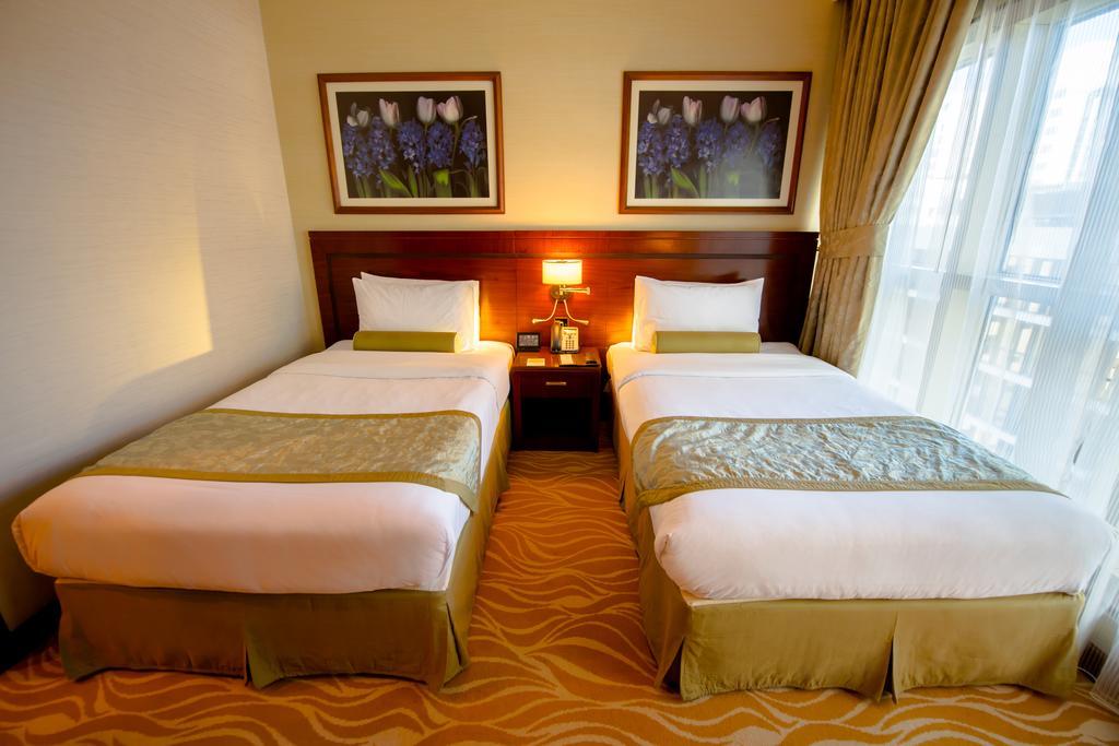 แกรนด์ เมอร์เคียว เรสซิเดนซ์ อาบู ดาบี Aparthotel อาบูดาบี ภายนอก รูปภาพ A room at the hotel